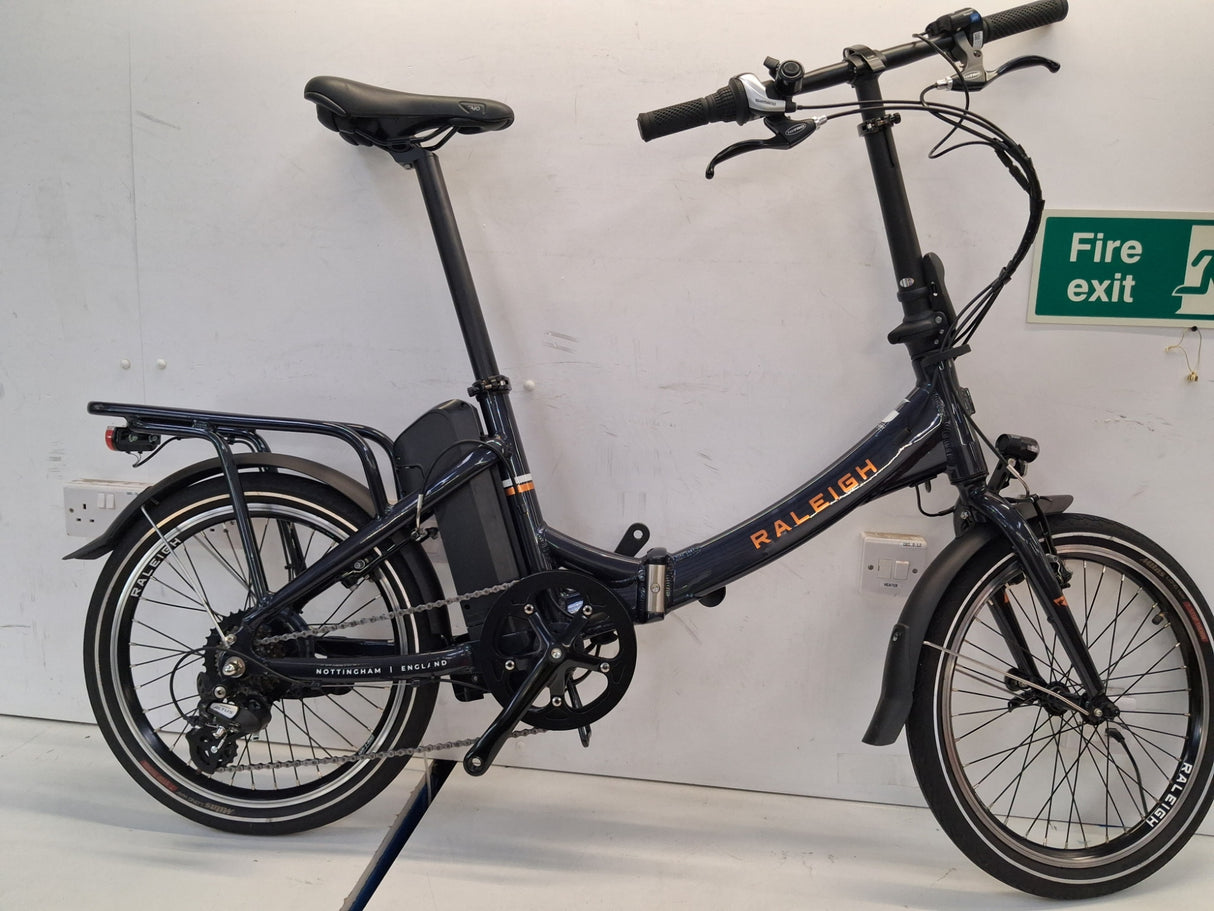 Raleigh Stow-E-Way Folding Compact 7~Speed 20" Wheel Alloy E--Bike Dark Blue